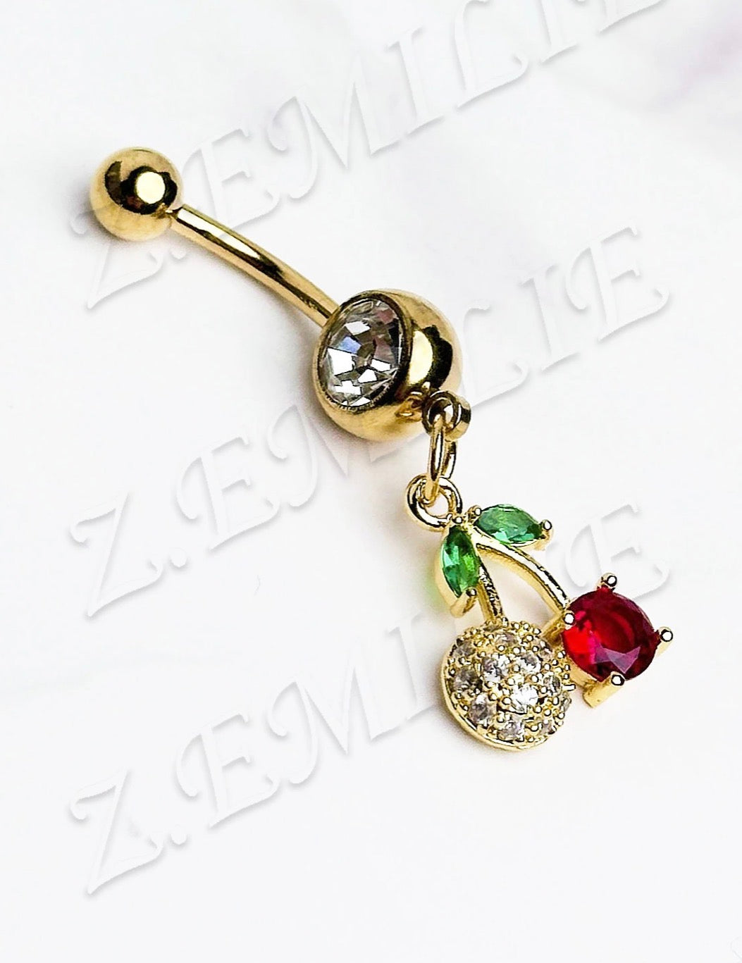 Piercing nombril cerise 🍒 Doré