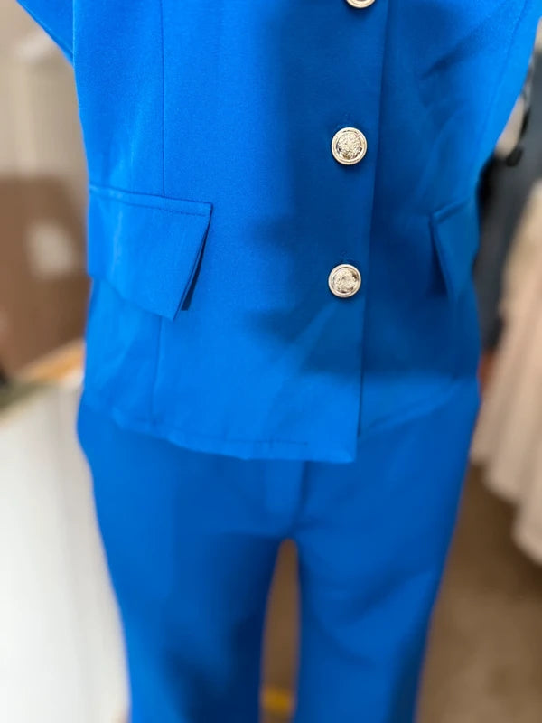 Ensemble gilet asymétrique à boutons et pantalon