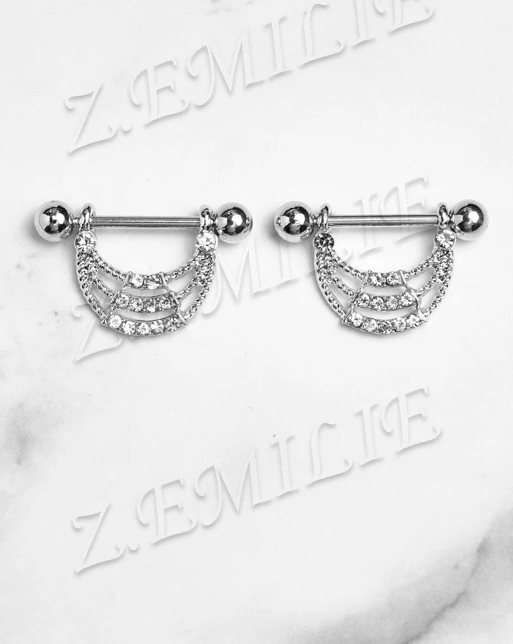 Piercing téton Argenté 
Z. Emilie