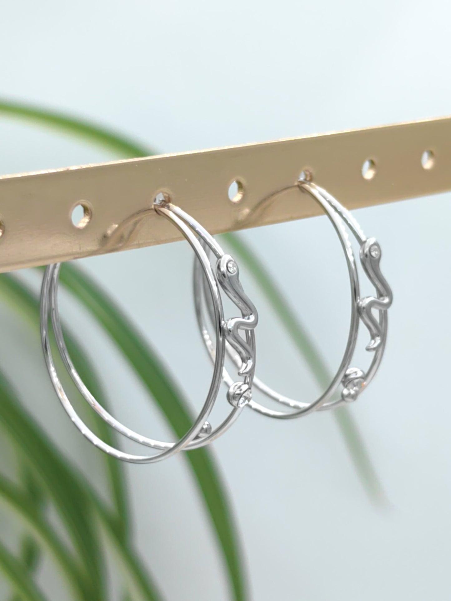 Boucles d'oreilles créoles serpents et strass en acier inoxydable Glam Chic